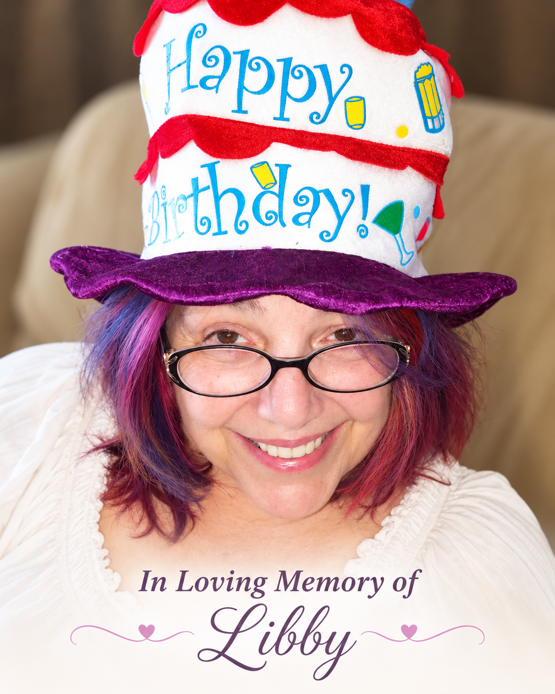 Libby smiling in her colorful Happy Birthday hat, with an In Loving Memory of Libby dedication